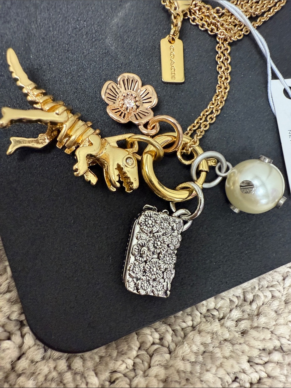 Rare COACH Rexy Gold-Tone Multi-Charm Necklace with Rexy, Pearl & Floral Charms - Picture 6 of 8